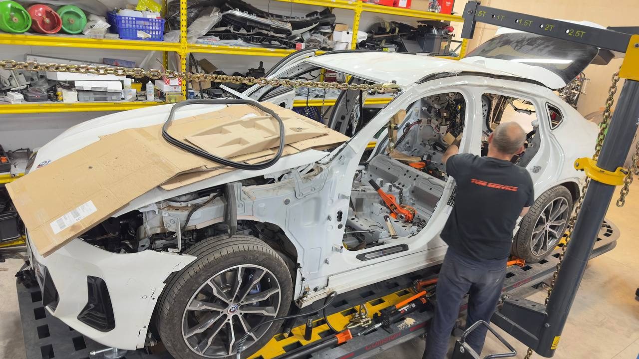 Trabajo en bancada — restauración de geometría de carrocería
